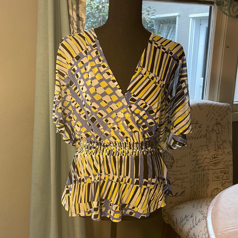 Bebé blouse, cut out sleeves